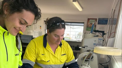 Katerin Romero and Macy Richman classifying Thev first ever lentil delivery_web.jpg