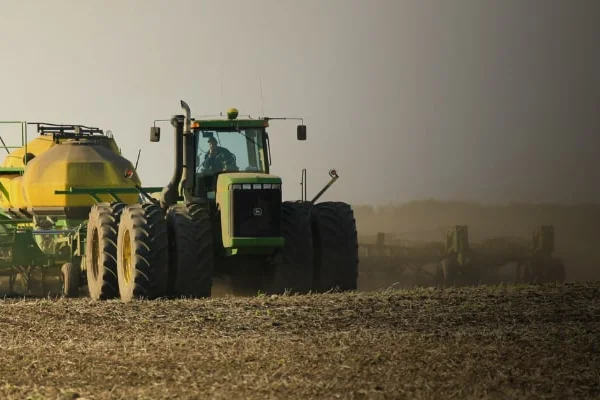 Combine harvester on a field