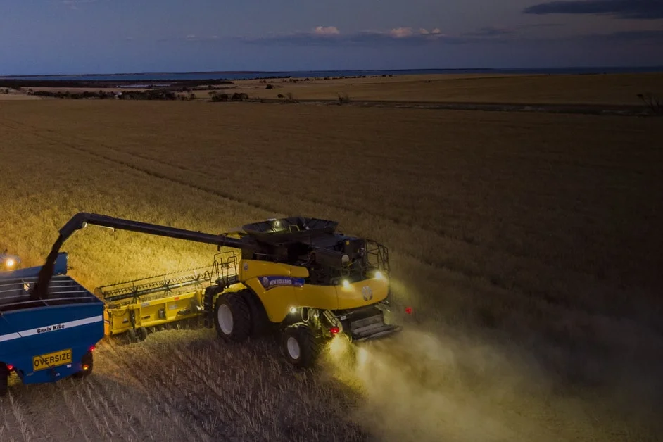 Harvesting a field for the production of agricultural commodities